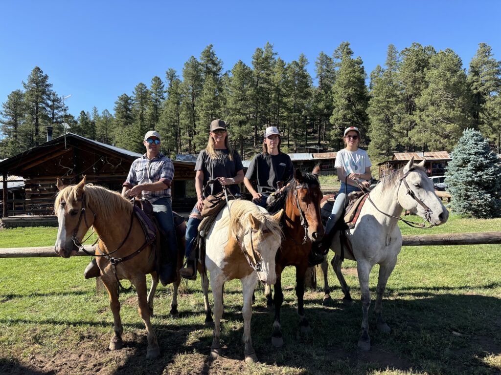A family enjoying distraction-free time together on their Arizona-based Family Ranch vacation